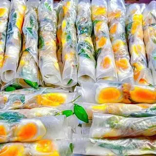 Hình ảnh Bánh tráng cuốn bơ béo trứng lòng đào - 1 cuốn