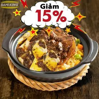 Hình ảnh Cơm thố bò sốt tiêu đen trứng cuộn