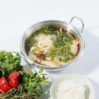 Hình ảnh Cá tầm nấu măng chua