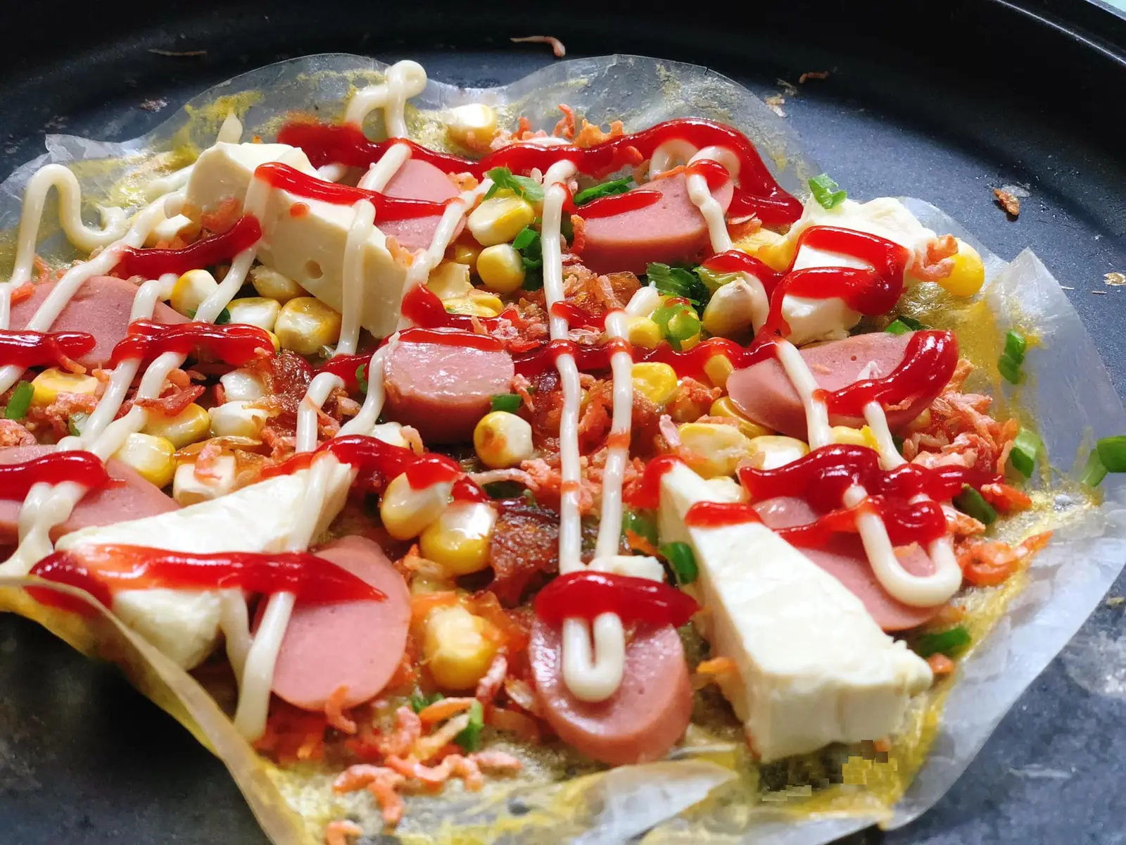 Hình ảnh Bánh tráng nướng phô mai bò cười