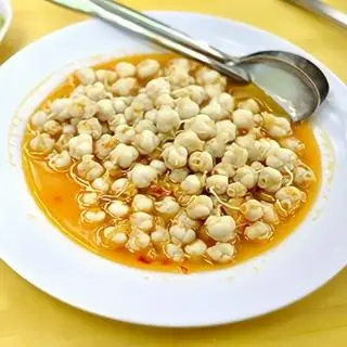 Hình ảnh Mực xào bơ cay kèm bánh mì