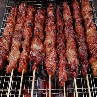 Hình ảnh Xiên heo nướng bơ