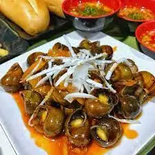 Hình ảnh Ốc Mít Xào Me Chua Ngọt