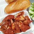 Hình ảnh Combo 1 Gà Nướng Muối Ớt Cay - 2 Bánh Mì - 1 Đồ Chua Ngọt - Dưa Leo, Rau Răm, 1 Túi Nước Chấm