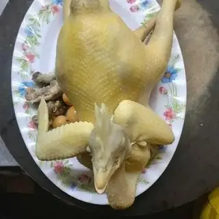 Hình ảnh Gà ta nguyên con thêm bộ lòng có cháo gỏi