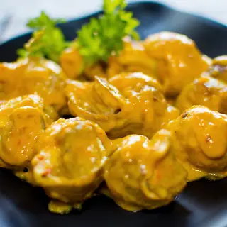 Hình ảnh Ốc bulot sốt trứng muối