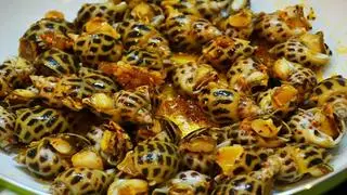 Hình ảnh Ốc hương xào me