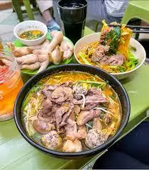 Hình ảnh Mì chua cay tim cật óc