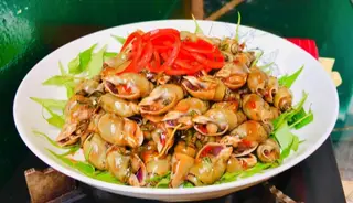 Hình ảnh Ốc cà na xào me