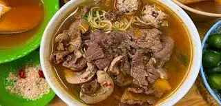 Hình ảnh Mì chua cay bò