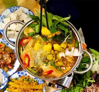 Hình ảnh Lẩu ếch cải chua