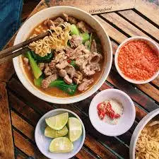 Hình ảnh Mì chua cay bò óc