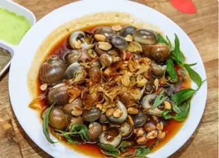 Hình ảnh Ốc mỡ (lon)rang me